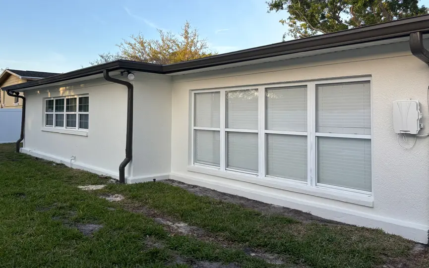 Home renovation project in Florida showcasing exterior painting results by a remodeling company.