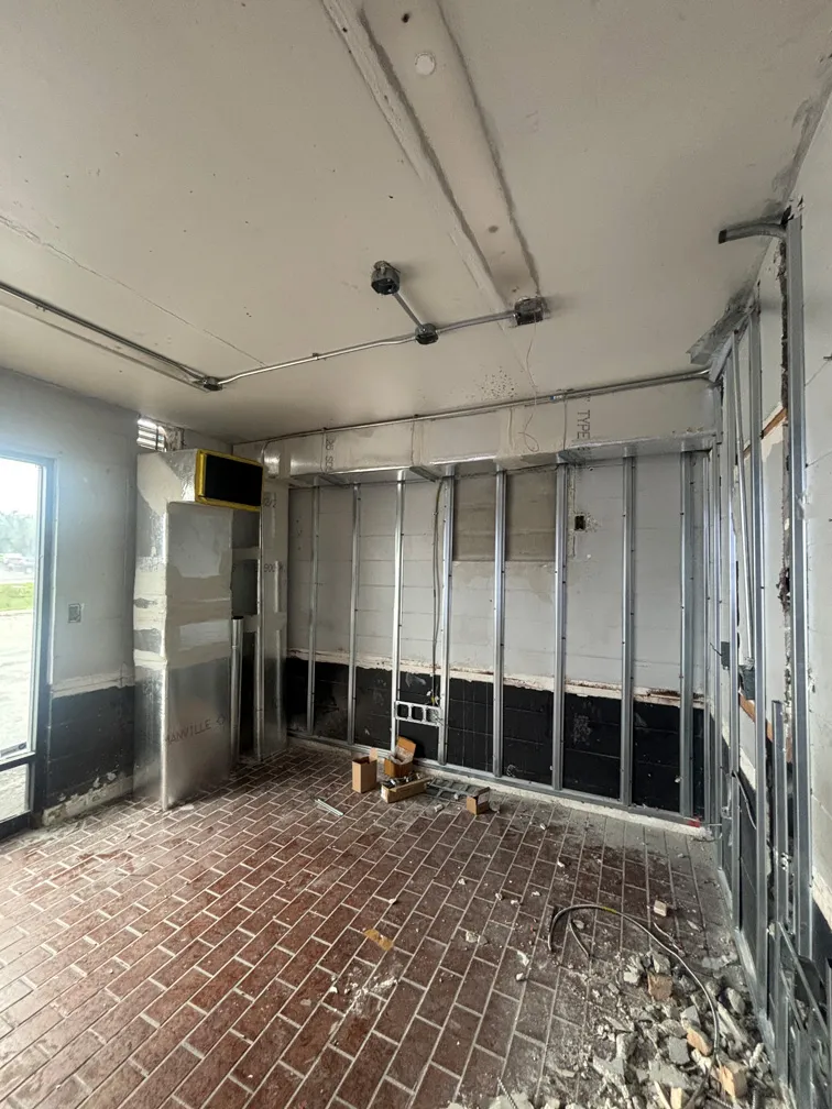 Metal framing installation for drywall at car wash restoration in Winter Park, FL