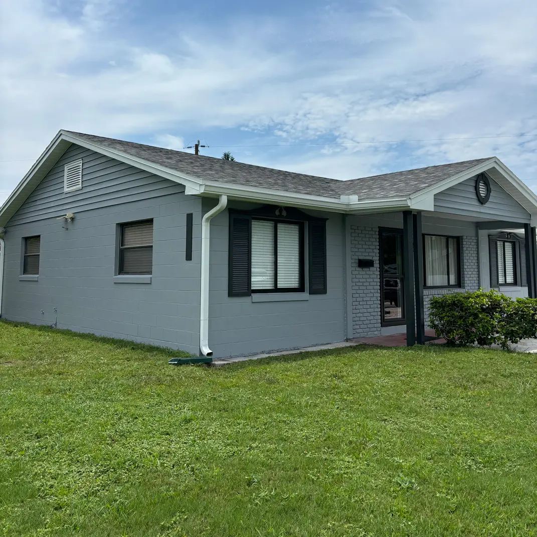 Remodeled single-story home exterior after renovation in Florida