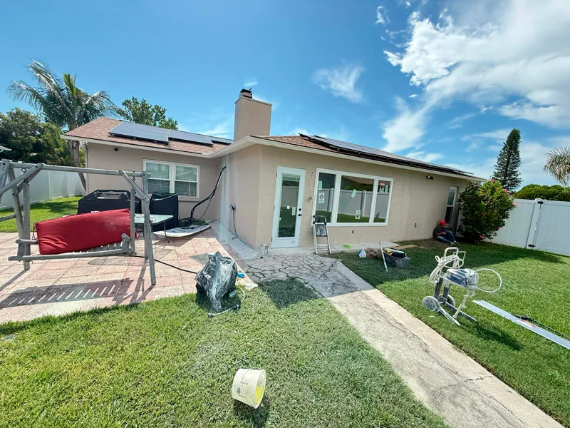 Exterior view of completed room addition with stucco and paint – New Port Richey